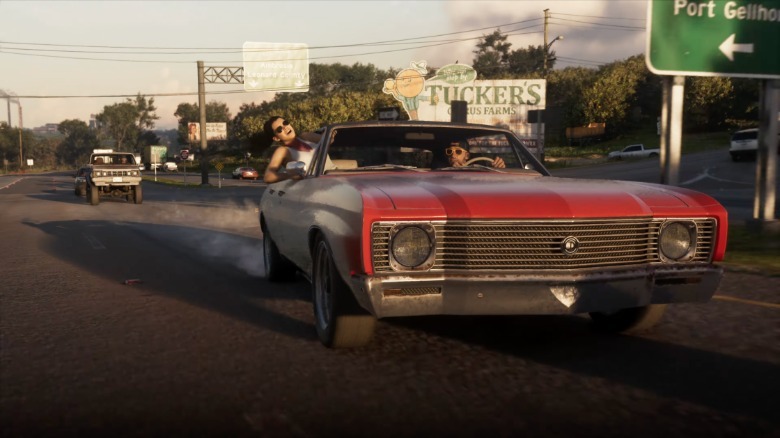 Ein rotes Muscle-Car, das in GTA6 driftet.
