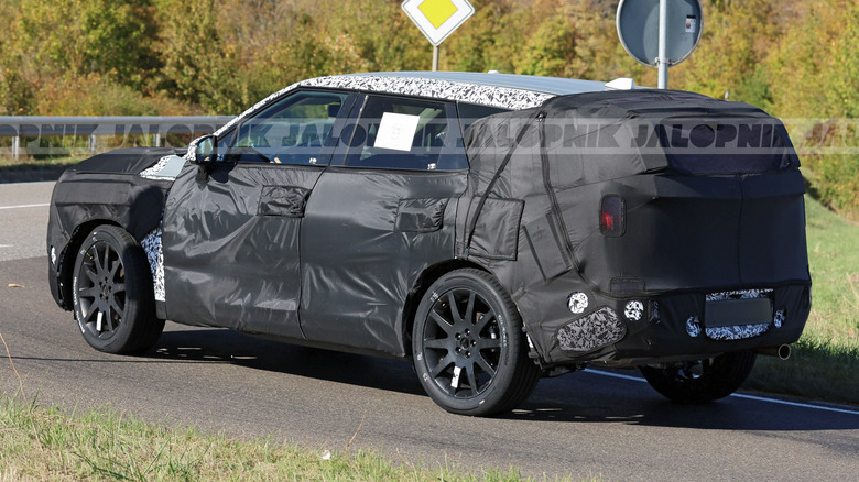 Hintere 3/4-Ansicht eines 2028 Kia Sportage